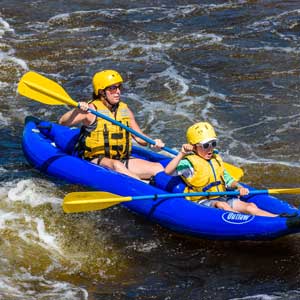 Dog Leg Rapid in a Sport Yak with Kids